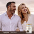 Middle-aged couple smiling, looking away with a Black Garlic bottle beside them.