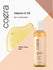 Graphic stating Vitamin E Oil, skin moisturizer, 100% Pure Oils, with Coera Vitamin E Oil bottle and oil texture.