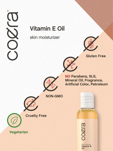 Coera Vitamin E Oil bottle with icons indicating Gluten Free, No Parabens, SLS, Mineral Oil, Fragrance, Artificial Color, Petroleum, NON-GMO, Cruelty Free, and Vegetarian.