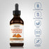 Liquid Turmeric + Ginger bottle with icons indicating gluten, wheat, milk, lactose free, vegan, NON GMO, no artificial additives.
