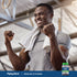 Young man smiling and flexing after a workout, showcasing Men's Multi Gummies in a lifestyle setting.