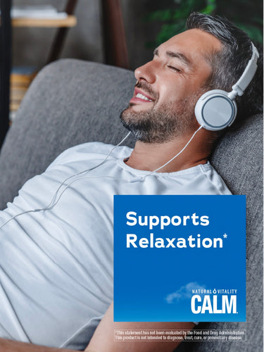 Middle-aged man relaxing on a couch with headphones, next to a Calm product graphic.