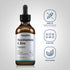 Niacinamide & Zinc Serum bottle with icons indicating no parabens, SLS, mineral oil, artificial color, fragrance; Non-GMO and vegetarian.