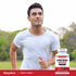 A young man jogging outdoors gives a thumbs up while holding a Nitric Oxide BeetFit Pro bottle.