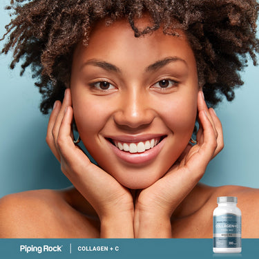 Smiling adult with hands resting on face and Piping Rock Collagen + C supplement bottle nearby