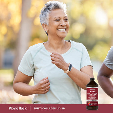 Adult smiling while walking outdoors, with a Piping Rock Multi Collagen Liquid bottle nearby