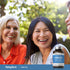 Two adult women laughing and talking outdoors, with a third woman partially visible and a Triple Strength Fish Oil bottle.