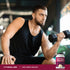 A young man works out with a dumbbell next to a tub of 100% Whey Isolate.