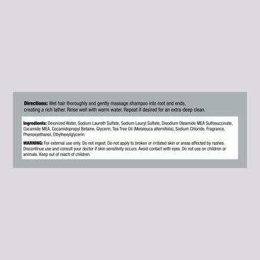 Detailed Supplement Facts for a 16 oz. Tea Tree Oil Shampoo bottle.