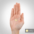 A single softgel rests on a hand, measuring 0.437 inches or 1.111 cm.