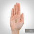 Capsule measuring 0.917 inches (2.329 cm) on a hand scale.
