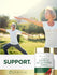 Mature couple practicing yoga outdoors in a park, next to a Carlyle Garlic & Cayenne bottle.