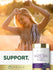 Woman laughing while holding a phone and a bottle of Carlyle Grape Seed Extract above her head.
