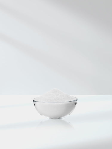 Horbaach Electrolytes Hydration Powder, 16 oz, displayed as white powder in a glass bowl on a white surface.