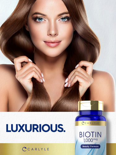 Lifestyle image of woman with long brown hair holding her hair, with Carlyle Biotin 1,000 mcg bottle and graphic stating LUXURIOUS.
