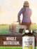 Lifestyle image of adult sitting on a wooden fence overlooking a field with Heritage Farmstead Grassfed Tallow 3120MG supplement bottle nearby