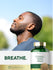 Lifestyle image of adult outdoors with eyes closed, Carlyle Fennel Seed 480MG bottle, and graphic stating BREATHE.