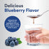 NCL Hyaluronic Acid Liquid Berry, Delicious Blueberry Flavor. A spoonful of liquid drips into a glass, with fresh blueberries.