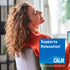 Young woman relaxing in a chair with Natural Vitality Calm graphic stating 'Supports Relaxation*'.