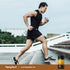 A young man runs up stairs next to a Glucosamine bottle.