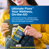 Young adult woman putting an Ultimate Flora Probiotic 50 Billion GO PACK into her black quilted purse.